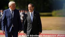 German President Frank-Walter Steinmeier, left, welcomes Israel's President Isaac Herzog, right, for an official visit at Bellevue Palace Berlin, Germany, Sunday, Sept. 4, 2022. (AP Photo/Markus Schreiber)