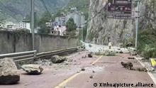(220905) -- LUDING, Sept. 5, 2022 (Xinhua) -- Fallen rocks are seen on a road near Lengqi Town in Luding County of southwest China's Sichuan Province Sept. 5, 2022. A 6.8-magnitude earthquake jolted Luding County at 12:52 p.m. (0452 GMT) Monday, according to the China Earthquake Networks Center. (Xinhua)