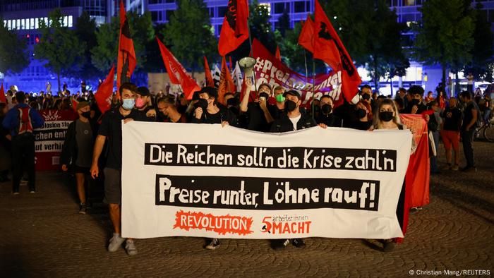 People take part in a left-wing protest against increasing energy prices and rising living expenses in Leipzig, Germany