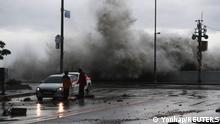 A wave caused by Typhoon Hinnamnor hits the waterfront in Busan, South Korea, September 6, 2022. Yonhap/via REUTERS. ATTENTION EDITORS - THIS IMAGE HAS BEEN SUPPLIED BY A THIRD PARTY. NO RESALES. NO ARCHIVE. SOUTH KOREA OUT. NO COMMERCIAL OR EDITORIAL SALES IN SOUTH KOREA.