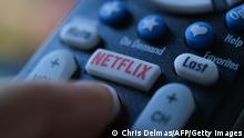 In this illustration photo taken on July 19, 2022 the Netflix logo is seen on a TV remote in Los Angeles. - Netflix reported losing subscribers for the second quarter in a row Tuesday as the streaming giant battles fierce competition and viewer belt tightening, but the company assured investors of better days ahead. The loss of 970,000 paying customers in the most recent quarter was not as big as expected, and left Netflix with just shy of 221 million subscribers. (Photo by Chris DELMAS / AFP) (Photo by CHRIS DELMAS/AFP via Getty Images)