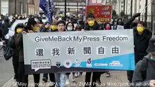 January 15, 2022, London, United Kingdom: Protesters march with a banner, saying ''Give me back my press freedom'' during the demonstration..Hongkongers in London gather at Piccadilly Circus to protest against the decline of press freedom in Hong Kong, then march to the Hong Kong Economic and Trade Office handed in letters individually in response to the recent closure of several media outlets in Hong Kong. (Credit Image: © May James/SOPA Images via ZUMA Press Wire