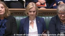 In this grab taken from video, Britain's Prime Minister Liz Truss listens during Prime Minister's Questions in the House of Commons, London, Wednesday, Sept. 7, 2022 (House of Commons/PA via AP)