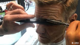 Μούσα, κουρέας