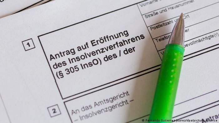 The photo shows a section of a form that is used to apply to the district court for the opening of insolvency proceedings