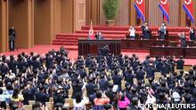 North Korea's leader Kim Jong Un acknowledges the applause of deputies in the Supreme People's Assembly, North Korea's parliament, which passed a law officially enshrining its nuclear weapons policies, in Pyongyang, North Korea, September 8, 2022 in this photo released by North Korea's Korean Central News Agency (KCNA). KCNA via REUTERS ATTENTION EDITORS - THIS IMAGE WAS PROVIDED BY A THIRD PARTY. REUTERS IS UNABLE TO INDEPENDENTLY VERIFY THIS IMAGE. NO THIRD PARTY SALES. SOUTH KOREA OUT. NO COMMERCIAL OR EDITORIAL SALES IN SOUTH KOREA.