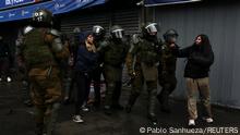Police react against demonstrators during a protest demanding better conditions and improved infrastructure for studying, in Santiago, Chile September 8, 2022. REUTERS/Pablo Sanhueza
