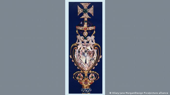 Apart from Koh-i-Noor, some crown jewels are also claimed from other latitudes.  For example, from Africa, they listen to the big star of Africa.  Pictured is the Great Star of Africa, the huge Cullinan diamond, on the king's royal scepter and a large orb of amethyst on it.  From Sketch magazine, published in 1937.