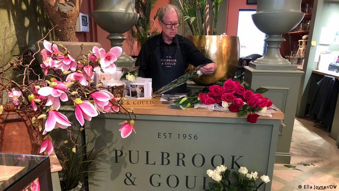 flower shop behind the counter