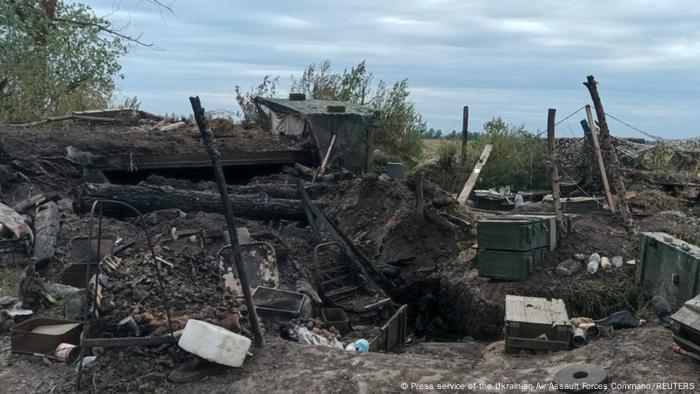  Destroyed and burnt military equipment at a Russian position in the Kharkiv region (Press service of the Ukrainian Air Assault Forces Command/REUTERS)