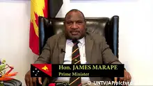 RETRANSMISSION TO CORRECT DATE - In this image made from UNTV video, James Marape, Prime Minister of Papua New Guinea, speaks in a pre-recorded message which was played during the 75th session of the United Nations General Assembly, Friday, Sept. 25, 2020, at U.N. Headquarters. (UNTV Via AP )