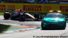 Red Bull driver Max Verstappen of the Netherlands steers his car behind safety car during the Italian Grand Prix at the Monza racetrack, in Monza, Italy, Sunday, Sept. 11, 2022. (AP Photo/Luca Bruno)
