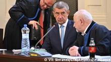 12.09.2022
Former prime minister Andrej Babis, center, at the Prague Municipal Court in Prague. Czech Republic, Monday, Sept. 12, 2022. Babis goes on trial after the prosecution indicted him in a $2 million fraud case involving European Union subsidies. (Vit Simanek/CTK via AP).