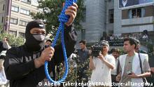 抗议活动仍在继续 伊朗首位示威者遭处决