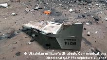 13.09.2022****This undated photograph released by the Ukrainian military's Strategic Communications Directorate shows the wreckage of what Kyiv has described as an Iranian Shahed drone downed near Kupiansk, Ukraine. Ukraine's military claimed Tuesday, Sept. 13, 2022, for the first time that it encountered an Iranian-supplied suicide drone used by Russia on the battlefield, showing the deepening ties between Moscow and Tehran as the Islamic Republic's tattered nuclear deal with world powers hangs in the balance. (Ukrainian military's Strategic Communications Directorate via AP)