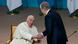 President Kassym-Jomart Tokayev, right, greets Pope Francis as he arrives at a meeting with authorities President Kassym-Jomart Tokayev, right, greets Pope Francis as he arrives at a meeting with authorities