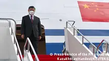 Chinese President Xi Jinping disembarks from the plane upon his arrival in Nur-Sultan, Kazakhstan September 14, 2022. Press service of the President of Kazakhstan/Handout via REUTERS ATTENTION EDITORS - THIS IMAGE HAS BEEN SUPPLIED BY A THIRD PARTY. MANDATORY CREDIT.