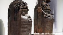 Benin Bronzes, that were stolen in Africa during colonial times, are displayed in Berlin, Germany, Thursday, Sept. 15, 2022. The Humboldtforum museum opens fully to the public this week with a very modern take on the display of cultural items from around the world and the debate over demands for some of them to be returned to their homelands. (AP Photo/Michael Sohn)