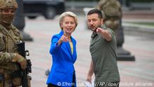 Ukrainian President Volodymyr Zelenskyy, right, and European Commission President Ursula von der Leyen talk during their meeting in Kyiv, Ukraine, Thursday, Sept. 15, 2022. (AP Photo/Efrem Lukatsky)