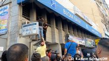 Beirut, Libanon.
Serial Bank Holdups by Depositors Across Lebanon
Lebanese citizens gathered outside a Beirut branch of Blom Bank to support of a depositor is taking hostages and demanding to withdraw his deposit.
