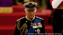Britain's King Charles III attends a vigil for Queen Elizabeth II, as she lies in state on the catafalque in Westminster Hall, at the Palace of Westminster, London, Friday Sept. 16, 2022. (Hannah McKay/Pool Photo via AP)