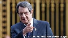 Cyprus' President of the Republic Nicos Anastasiades gestures as he arrives at the Palace of Versailles, near Paris, on March 11, 2022, for the EU leaders summit to discuss the fallout of Russia's invasion in Ukraine. - EU leaders are scrambling to find ways to urgently address the fallout of Russia's invasion of Ukraine that has imperilled the bloc's economy and exposed a dire need for a stronger defence. (Photo by Ludovic MARIN / AFP) (Photo by LUDOVIC MARIN/AFP via Getty Images)