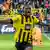 Youssoufa Moukoko celebrates his goal in the derby against Schalke