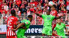 Union Berlin's German midfielder Janik Haberer (2nd R) and Wolfsburg's German midfielder Ridle Baku both jump to head the ball during the German first division Bundesliga football match betwen 1 FC Union Berlin and VfL Wolfsburg in Berlin on September 18, 2022. - - DFL REGULATIONS PROHIBIT ANY USE OF PHOTOGRAPHS AS IMAGE SEQUENCES AND/OR QUASI-VIDEO (Photo by John MACDOUGALL / AFP) / DFL REGULATIONS PROHIBIT ANY USE OF PHOTOGRAPHS AS IMAGE SEQUENCES AND/OR QUASI-VIDEO (Photo by JOHN MACDOUGALL/AFP via Getty Images)