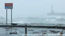 A storm surge is seen at Kamoike and Tarumi Ferry Port in Kagoshima Prefecture on Sept. 18, 2022.  According to Japan Meteorological Agency, Typhoon Nanmadol has become the highest classification of violent and it issued a special warning for southwestern regions in Kyushu, where a large-scale disaster could be imminent. The massive typhoon will keep on hitting Japan through early next week. ( The Yomiuri Shimbun via AP Images )