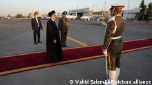 Iranian President Ebrahim Raisi, second left, reviews an honor guard during his official departure ceremony as he leaves Tehran's Mehrabad airport to New York to attend annual UN General Assembly meeting, Monday, Sept. 19, 2022. Raisi headed to New York on Monday, where he will be speaking to the U.N. General Assembly later this week, saying that he has no plans to meet with President Joe Biden on the sidelines of the U.N. event. (AP Photo/Vahid Salemi)