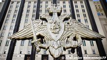 (FILES) This file photo taken on August 30, 2022 shows the emblem of the Russian Defence Ministry at its headquarters in Moscow. - President Vladimir Putin ordered a partial military mobilisation and vowed on September 21 to use all available means to protect Russian territory, after Moscow-held regions of Ukraine suddenly announced annexation referendums. (Photo by Alexander NEMENOV / AFP)