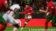 Portugal's forward Cristiano Ronaldo kicks the ball during the UEFA Nations League, league A group2 football match between Portugal and Switzerland at the Jose Alvalade stadium in Lisbon on June 5, 2022. (Photo by PATRICIA DE MELO MOREIRA / AFP)