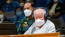 This handout photo taken and released by the Extraordinary Chamber in the Courts of Cambodia (ECCC) on September 22, 2022 shows ex-Khmer Rouge head of state Khieu Samphan (R) sits in the court room at the Extraordinary Chamber in the Courts of Cambodia (ECCC) in Phnom Penh. - Cambodia's UN-backed Khmer Rouge war crimes court gave its final verdict September 22, upholding the genocide conviction and life sentence imposed on the regime's last surviving leader. (Photo by NHET Sok Heng / Extraordinary Chambers in the Courts of Cambodia (ECCC) / AFP) / -----EDITORS NOTE --- RESTRICTED TO EDITORIAL USE - MANDATORY CREDIT AFP PHOTO / NHET SOK HENG/ Extraordinary Chambers in the Courts of Cambodia (ECCC) - NO MARKETING - NO ADVERTISING CAMPAIGNS - DISTRIBUTED AS A SERVICE TO CLIENTS