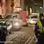 Swedish police guard a street following a series of detonations on Saturday