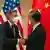 US Secretary of State Antony Blinken (left) handshakes China's Foreign Minister Wang Yi, photographed on September 23, 2022