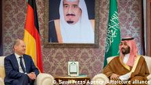 In this photo released by Saudi Press Agency, SPA, Saudi Crown Prince Mohammed bin Salman, right, receives Chancellor Olaf Scholz, Saturday, Sept. 24, 2022, in Jeddah, Saudi Arabia. (Saudi Press Agency via AP)