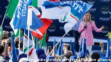 Brothers of Italy's Giorgia Meloni delivers her address during a party rally in Naples, Friday, Sep. 23, 2022. Italians will vote on Sunday in what is billed as a crucial election on a continent reeling from the repercussions of the war in Ukraine. (Alessandro Garofalo/LaPresse Via AP)