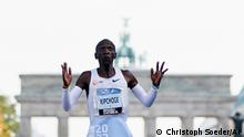 Kenya's Kipchoge breaks marathon world record in Berlin