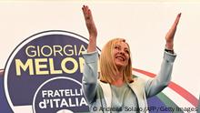 26.09.2022 | Leader of Italian far-right party Fratelli d'Italia (Brothers of Italy), Giorgia Meloni acknowledges the audience after she delivered an address at her party's campaign headquarters overnight on September 26, 2022 in Rome, after the country voted in a legislative election. - Far-right leader Giorgia Meloni won big in Italian elections on September 25, the first projections suggested, putting her eurosceptic populists on course to take power at the heart of Europe. (Photo by Andreas SOLARO / AFP) (Photo by ANDREAS SOLARO/AFP via Getty Images)
