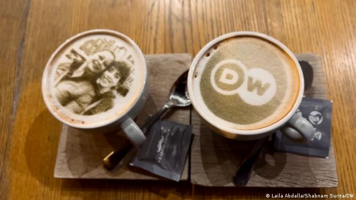 Selfieccino in Bratislava - two coffee pots with a selfie and the DW logo