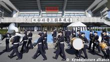 Self-Defense Force music band members take part in a rehearsal for the planned state funeral for slain former Japanese Prime Minister Shinzo Abe at the Nippon Budokan hall in Tokyo on Sept. 26, 2022, the eve of the ceremony. (Kyodo)