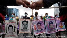 26.09.2022 *** Relatives and classmates of the missing 43 Ayotzinapa college students march in Mexico City, Monday, Sept. 26, 2022, on the anniversary of their disappearance in Iguala, Guerrero state. Three members of the military and a former federal attorney general were recently arrested in the case, and few now believe the government's initial claim that a local drug gang and allied local officials were wholly to blame for seizing and killing the students on July 26, 2014, most of which have never been found. (AP Photo/Marco Ugarte)