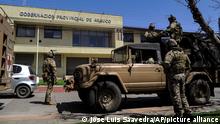14.10.2021 Soldiers patrol the front of a provincial government building in Arauco, in the Araucania region of southern Chile, Thursday, Oct. 14, 2021. President Sebastián Piñera declared a state of emergency Tuesday amid disturbances and attacks sometimes claimed by Indigenous Mapuche groups demanding the return of their ancestral lands. (AP Photo/Jose Luis Saavedra)