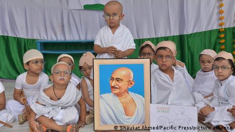 Schoolchildren dressed as Mahatma Gandhi