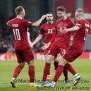 Hummel tone down Denmark jerseys, release black kits in Qatar