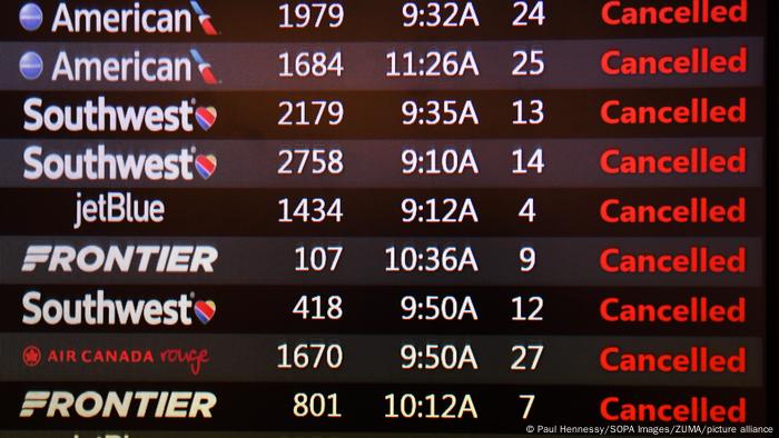 September 28, 2022, Orlando, Florida, United States: A screen at Orlando International Airport displays cancelled flights as the airport prepares to close as Hurricane Ian approaches the southwest coast of Florida. (