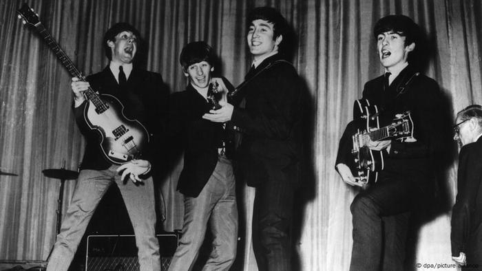 The Beatles performing.