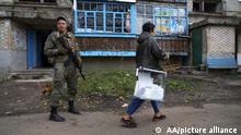 Okupowane tereny Ukrainy: „głosowanie” pod lufami karabinów