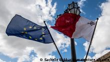 February 16, 2019 - Valletta, Malta - The flag of the European Union together with the flag of Malta at the Castille. Well over a year since the October 2017th assassination of Maltese journalist Daphne Caruana Galizia, the court cases against three defendants accused of the murder continues on with the Council of Europe and its partners stating Ã¢â¬Åno credible indication Malta is investigating who commissioned the assassination of Daphne Caruana GaliziaÃ¢â¬Â. Galizia was reporting on high-level, international financial crimes that were linked to Maltese politicians and businesspeople. A small group of primarily female activists under the banner of Occupy Justice Malta regularly plans and carries out performance demonstrations and monthly vigils on or about the anniversary of the assassination. The group lays candles for Daphne Galizia at the Siege Memorial, which are often swiftly cleared, allegedly at the behest of Magistrate Owen Bonnici. Journalist Manuel Delia has therefore lobbed legal complaints against Bonnici citing free speech, but courts have judged that Delia has no proof he himself laid any candles or flowers down at the monument. The investigations into the murder have brought in many names from MaltaÃ¢â¬â¢s business and political elite and linked them to financial irregularities and corrupt practices. Among them being Yorgen Fenech alleged to be owner of 17 Black, gaming/casino venture