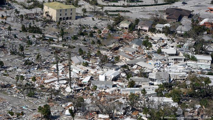Damaged homes and debris are shown in the aftermath of Hurricane Ian